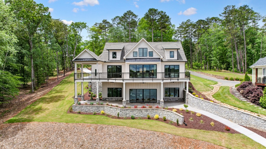Modern white exterior with black-framed windows