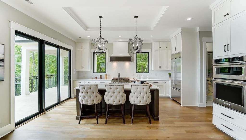 Open-plan kitchen with island and outdoor view